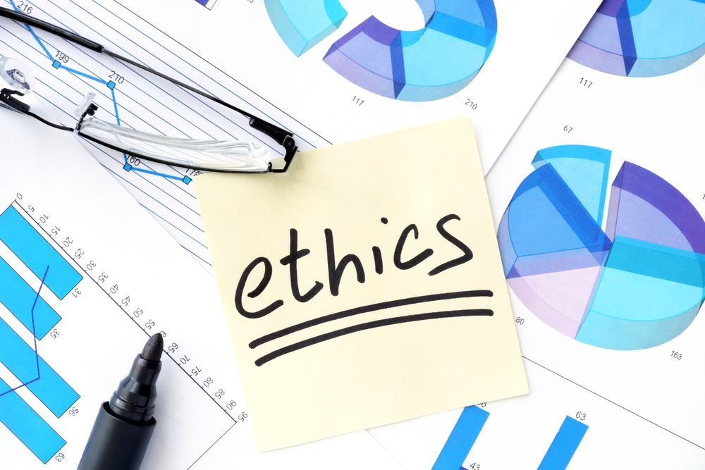 Papers,With,Graphs,,Glasses,And,Ethics,Business,Concept.